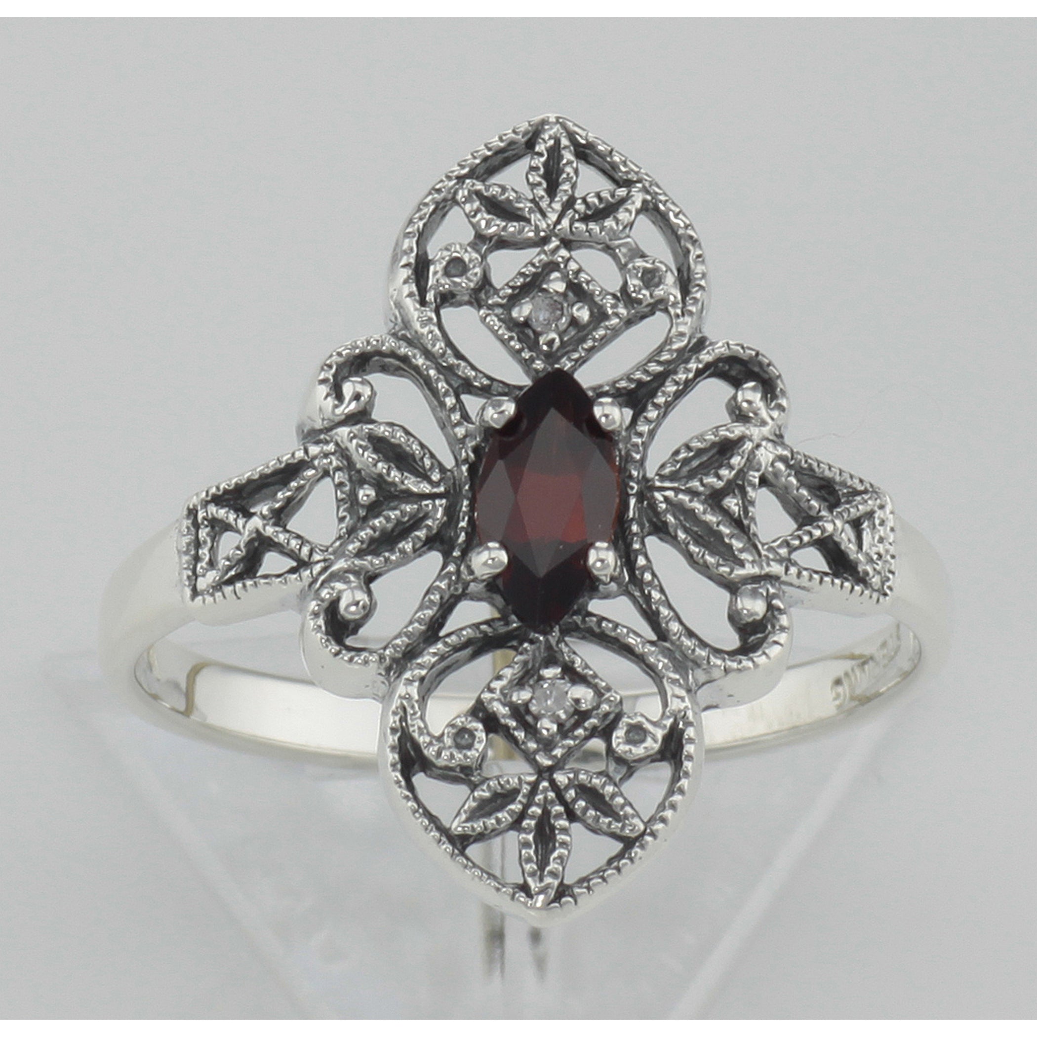 Detail view of Victorian Style Garnet Filigree Ring w/ Two Diamonds Sterling Silver highlighting Garnet, Diamond