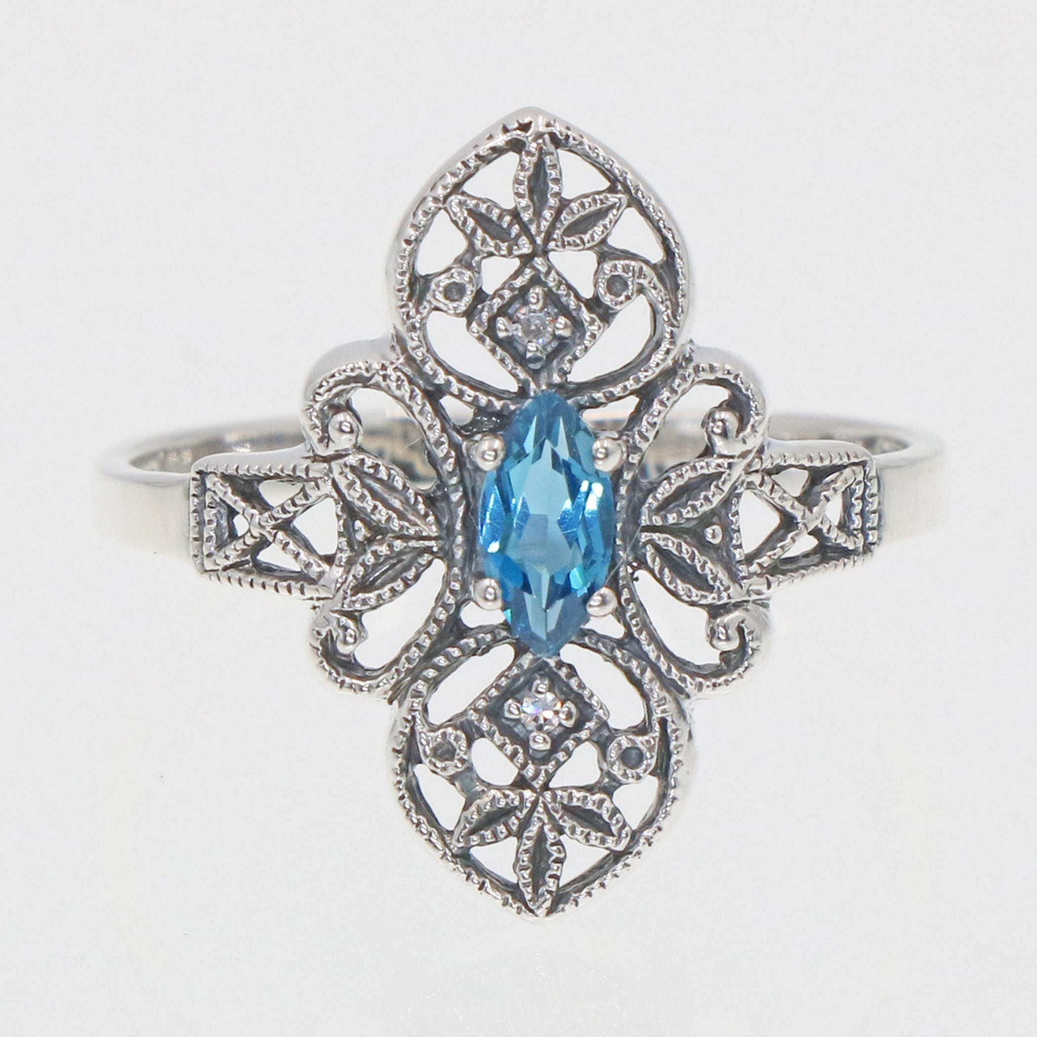 Detail view of Victorian Style London Blue Topaz Ring w/ 2 Diamonds highlighting Blue Topaz, London Blue Topaz
