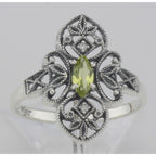 Detail view of Victorian Style Peridot Filigree Ring with Two Diamonds highlighting Diamond, Peridot