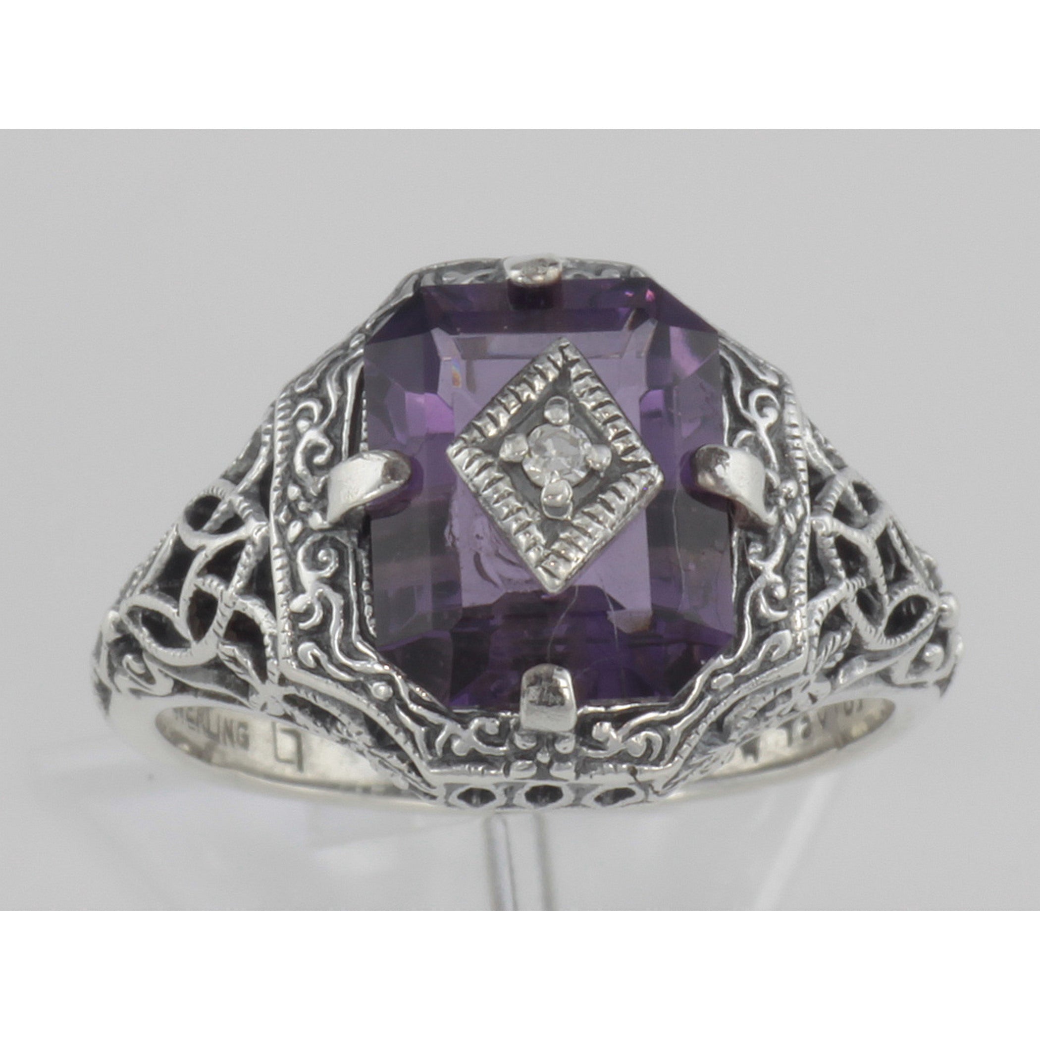 Detail view of Art Deco Style Emerald Cut Amethyst Filigree Ring Diamond Sterling Silver highlighting Amethyst, Emerald