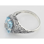 Detail view of Art Deco Emerald Cut Blue Topaz Filigree Ring Diamond Sterling Silver highlighting Blue Topaz, Emerald