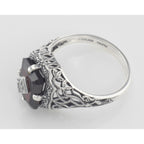 Back view of Art Deco Style Emerald Cut Garnet Filigree Ring w/ Diamond Sterling Silver showing 925 sterling silver hallmark