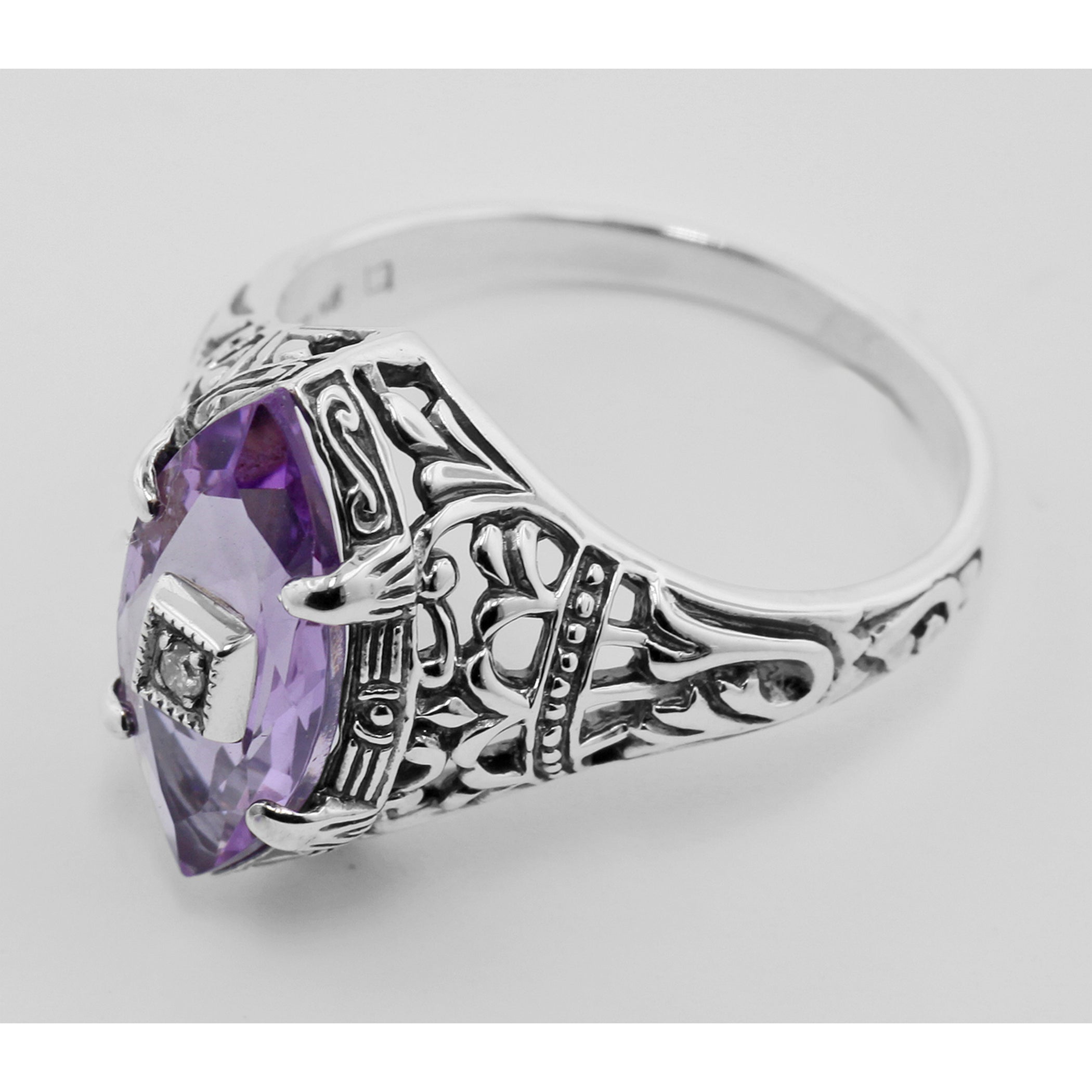 Detail view of Amethyst Filigree Ring w/ Diamond highlighting Amethyst, Diamond