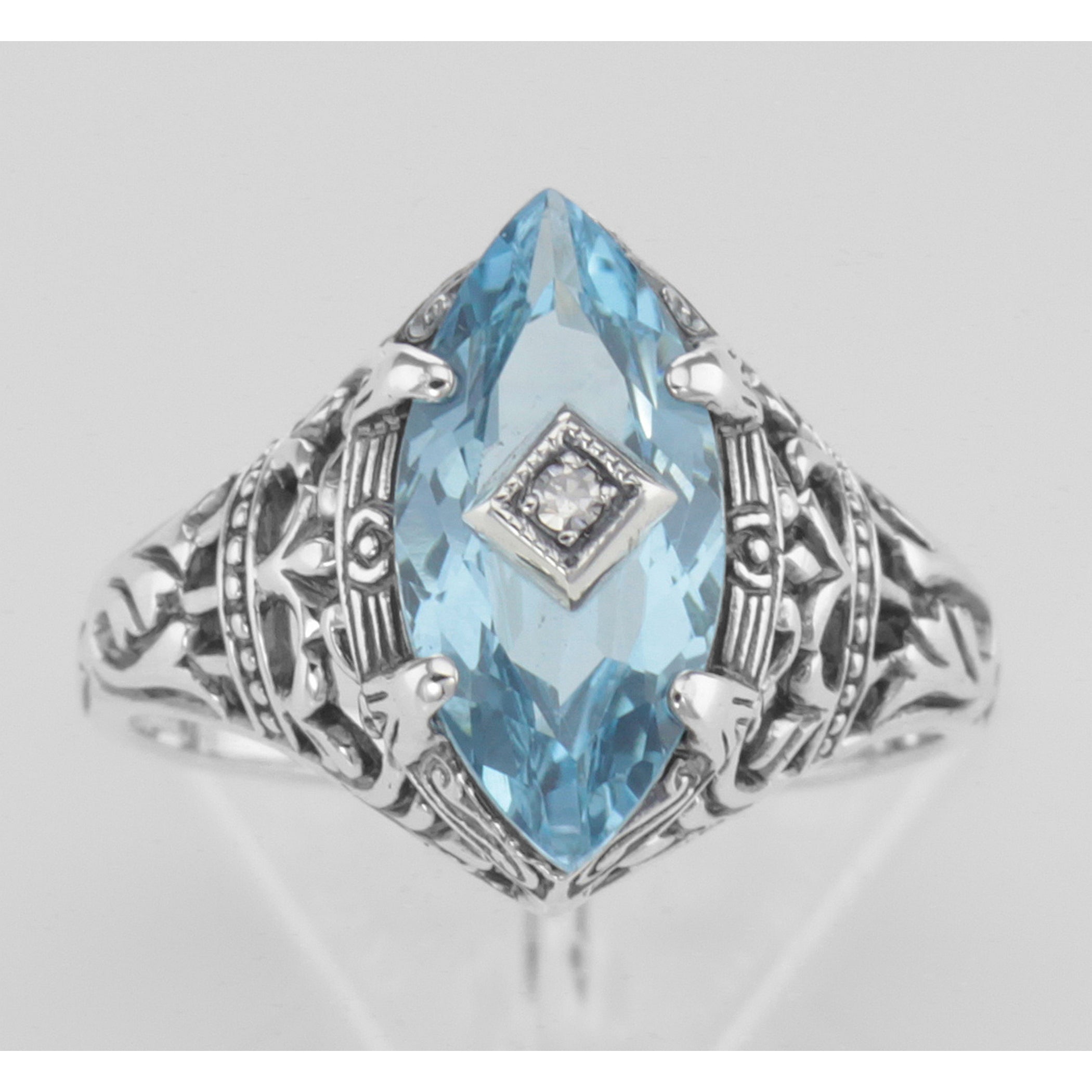 Detail view of Blue Topaz Filigree Ring w/ Diamond highlighting Blue Topaz, Diamond