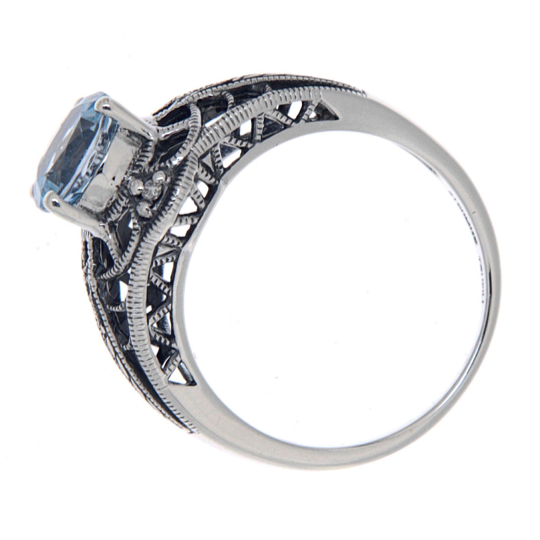 Back view of Art Deco Style Blue Topaz Filigree Ring with Four Diamonds Sterling 925 showing 925 sterling silver hallmark