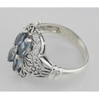 Back view of Antique Style Four Stone Blue Topaz and Diamond Ring showing 925 sterling silver hallmark