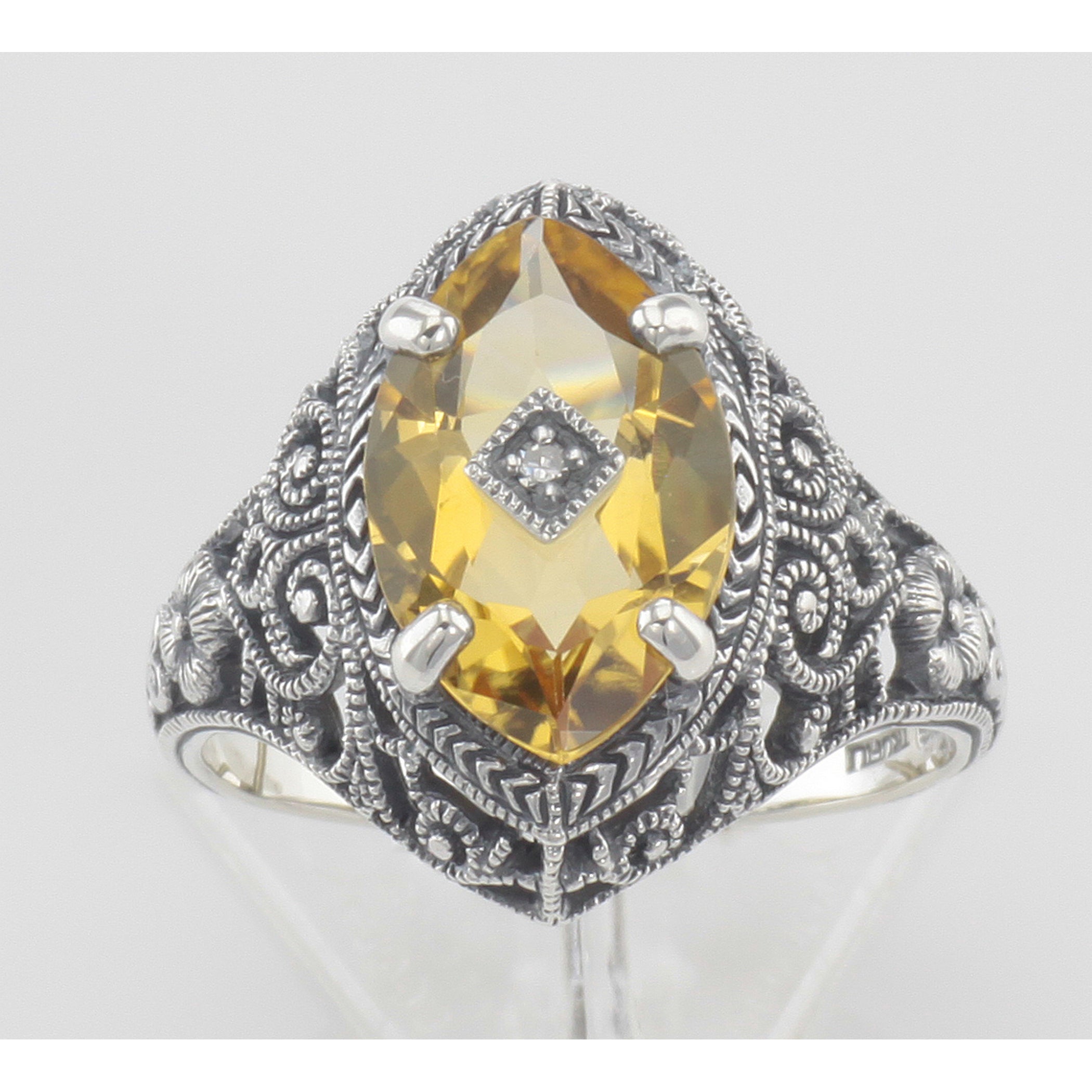 Detail view of Victorian Style Sterling Silver Citrine Filigree Ring w/ Diamond Center highlighting Citrine, Diamond