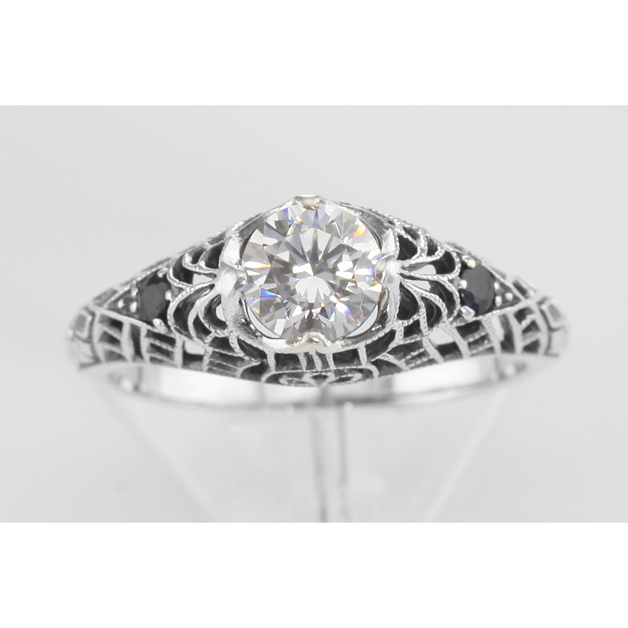 Detail view of White Topaz Filigree Ring with Genuine Sapphire Accents Sterling Silver highlighting White Topaz, Sapphire
