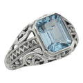 Filigree, Blue Topaz, Emerald, sterling silver rings, front view