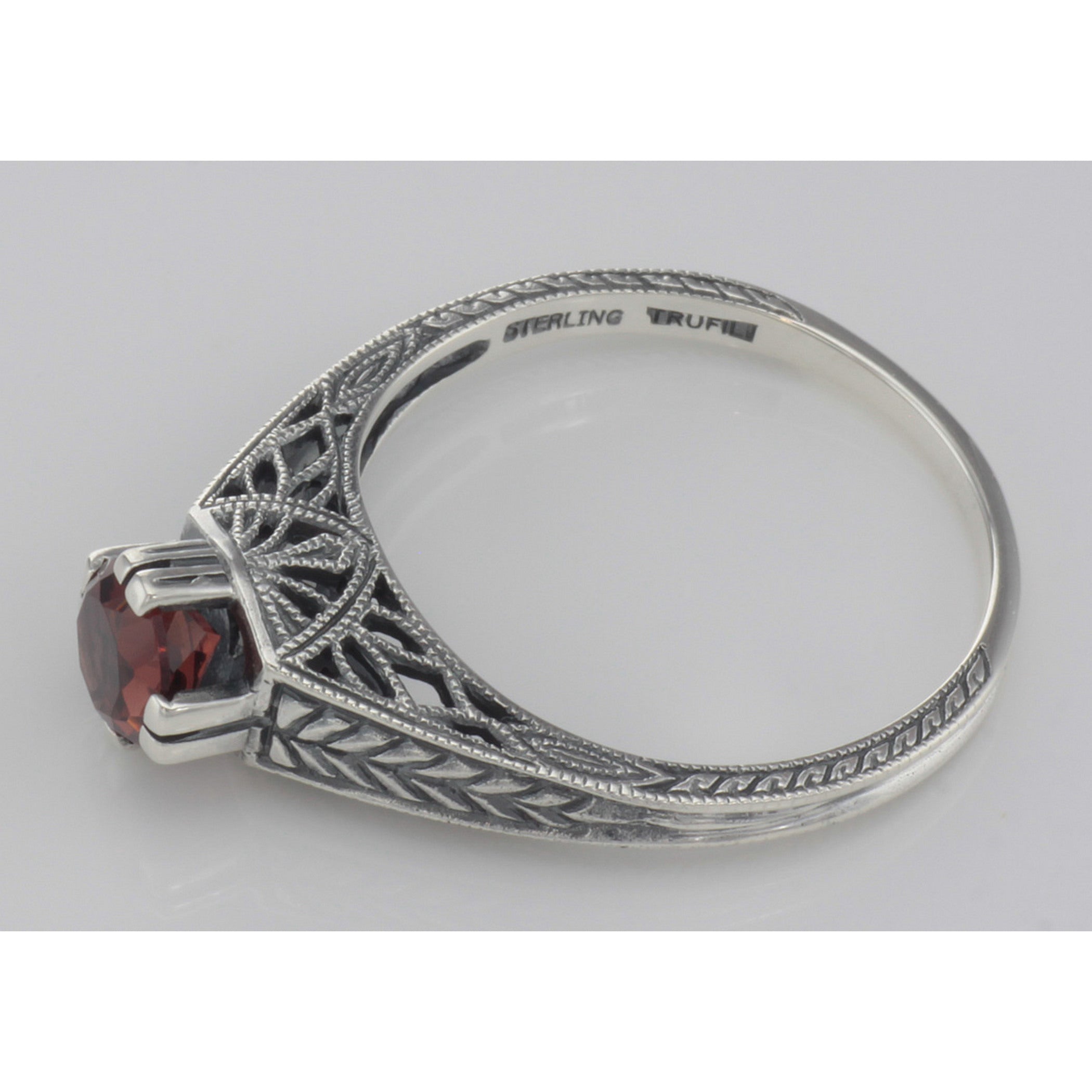 Back view of Victorian Style Natural Red Garnet Solitaire Filigree Ring Sterling Silver showing 925 sterling silver hallmark