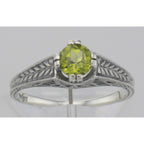 Detail view of Beautiful Victorian Style Peridot Solitaire Filigree Ring Sterling Silver highlighting Peridot
