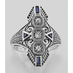 Detail view of Art Deco Filigree Ring White Topaz Blue Sapphire Accent Sterling Silver highlighting White Topaz, Sapphire