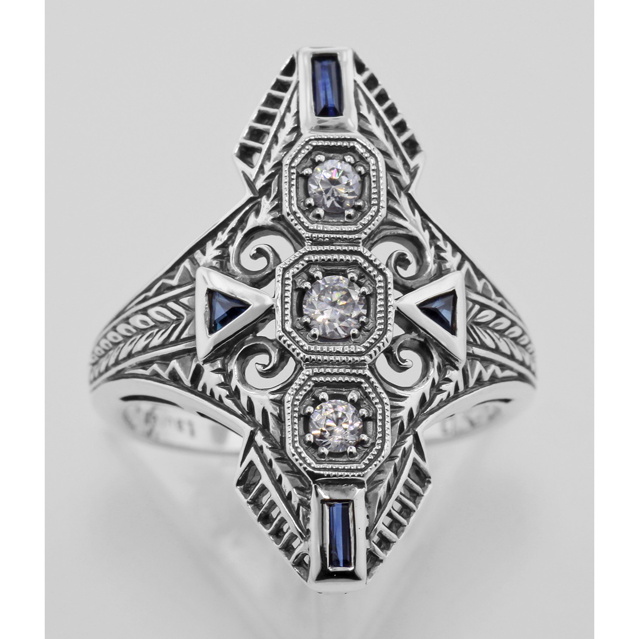 Detail view of Art Deco Filigree Ring White Topaz Blue Sapphire Accent Sterling Silver highlighting White Topaz, Sapphire