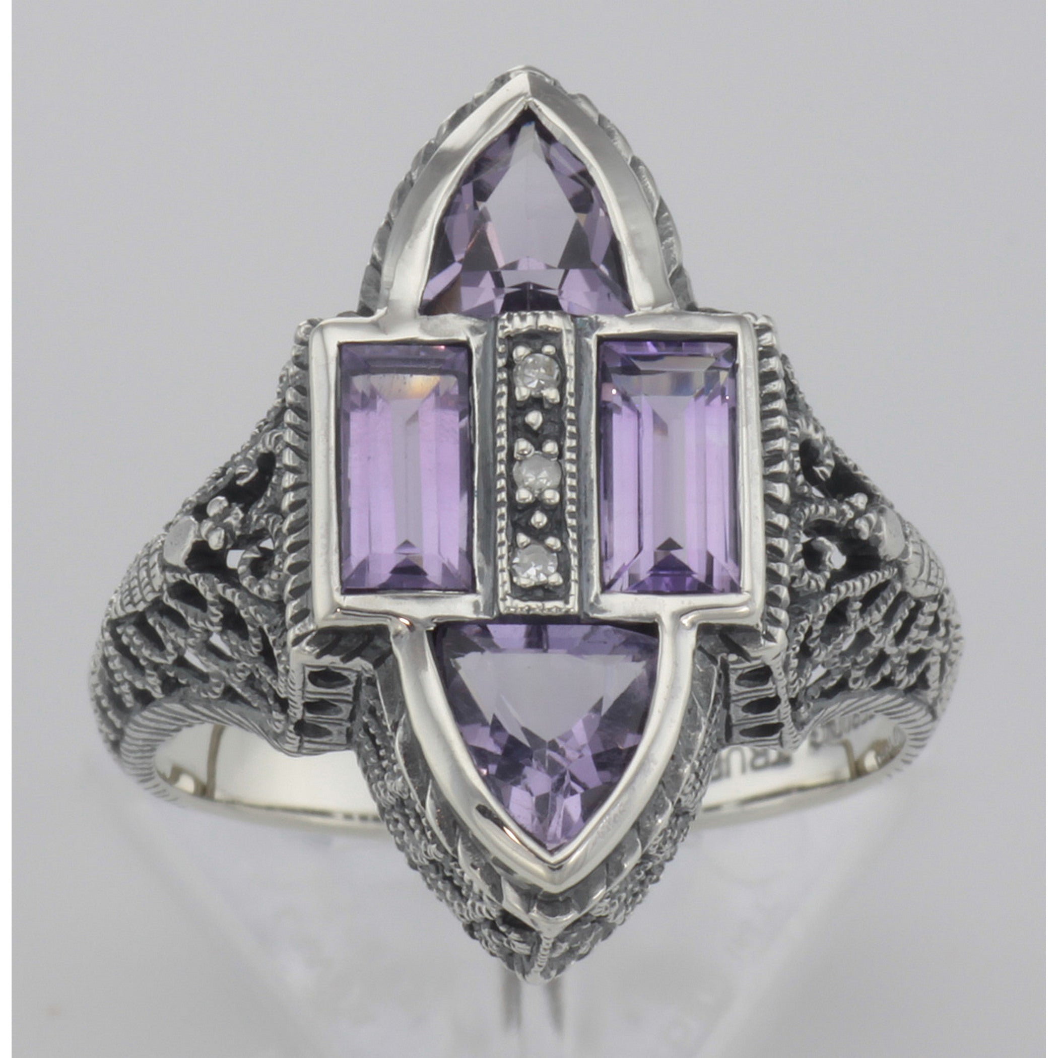 Detail view of Antique Style Four Stone Amethyst and Diamond Ring highlighting Amethyst, Diamond