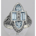 Detail view of Antique Style Four Stone Blue Topaz and Diamond Ring highlighting Blue Topaz, Diamond