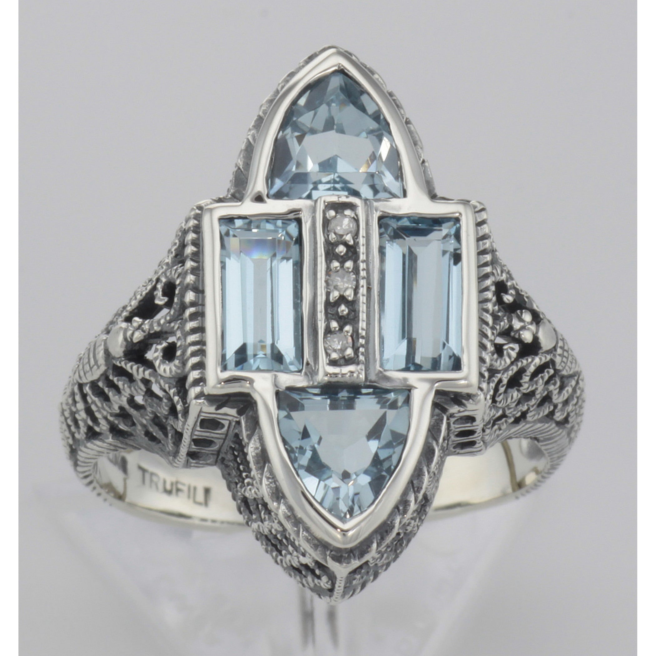 Detail view of Antique Style Four Stone Blue Topaz and Diamond Ring highlighting Blue Topaz, Diamond