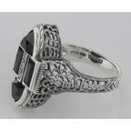 Back view of Antique Style Four Stone Black Spinel and Diamond Ring showing 925 sterling silver hallmark and pin back