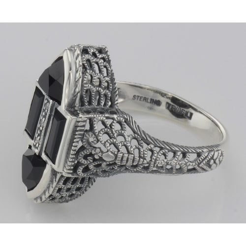 Back view of Antique Style Four Stone Black Spinel and Diamond Ring showing 925 sterling silver hallmark and pin back