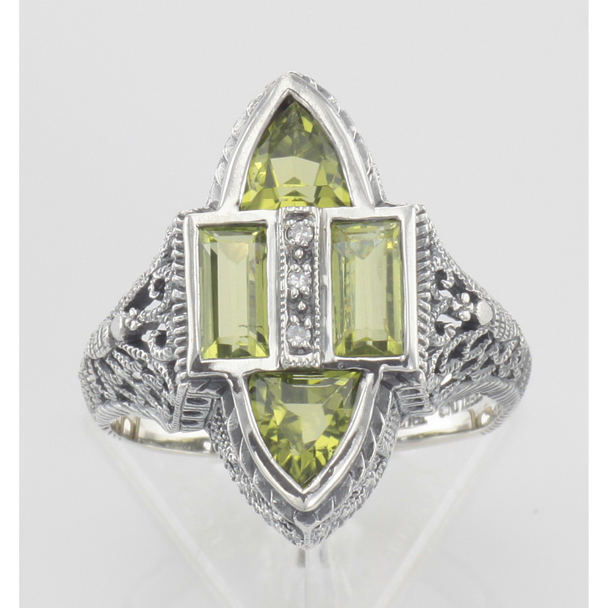 Detail view of Antique Style Four Stone Peridot and Diamond Ring highlighting Diamond, Peridot