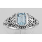 Detail view of Victorian Style Blue Topaz Filigree Ring Floral Design Sterling Silver highlighting Blue Topaz