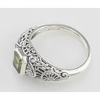 Detail view of Victorian Style Peridot Filigree Ring with Floral Design highlighting Peridot