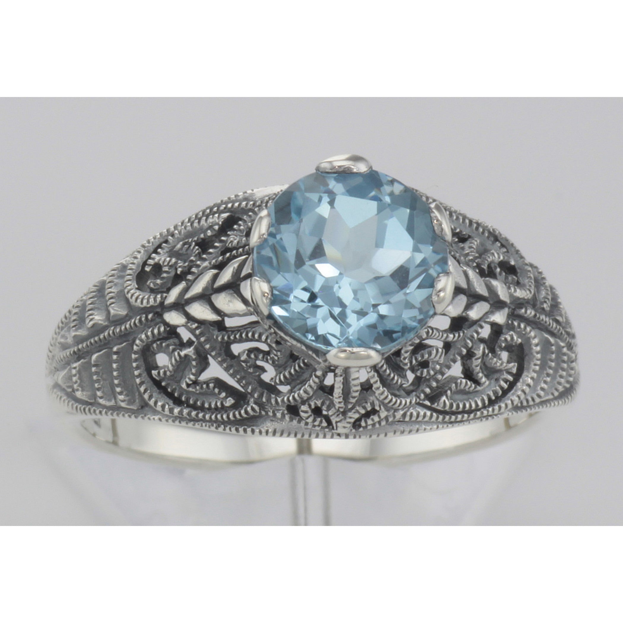 Detail view of Victorian Style Genuine Blue Topaz Solitaire Filigree Ring Sterling Silver highlighting Blue Topaz