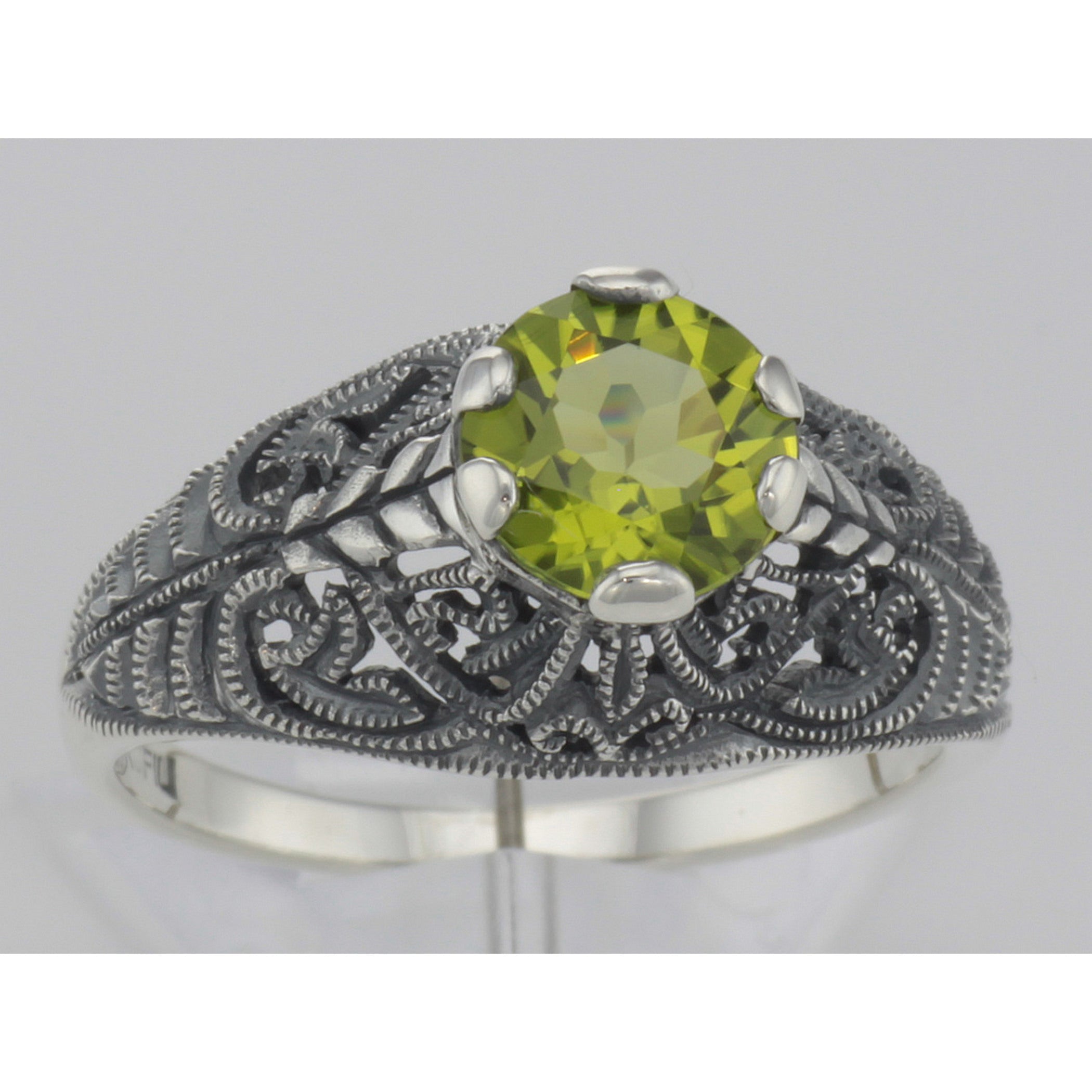 Detail view of Victorian Style Genuine Peridot Solitaire Filigree Ring highlighting Peridot