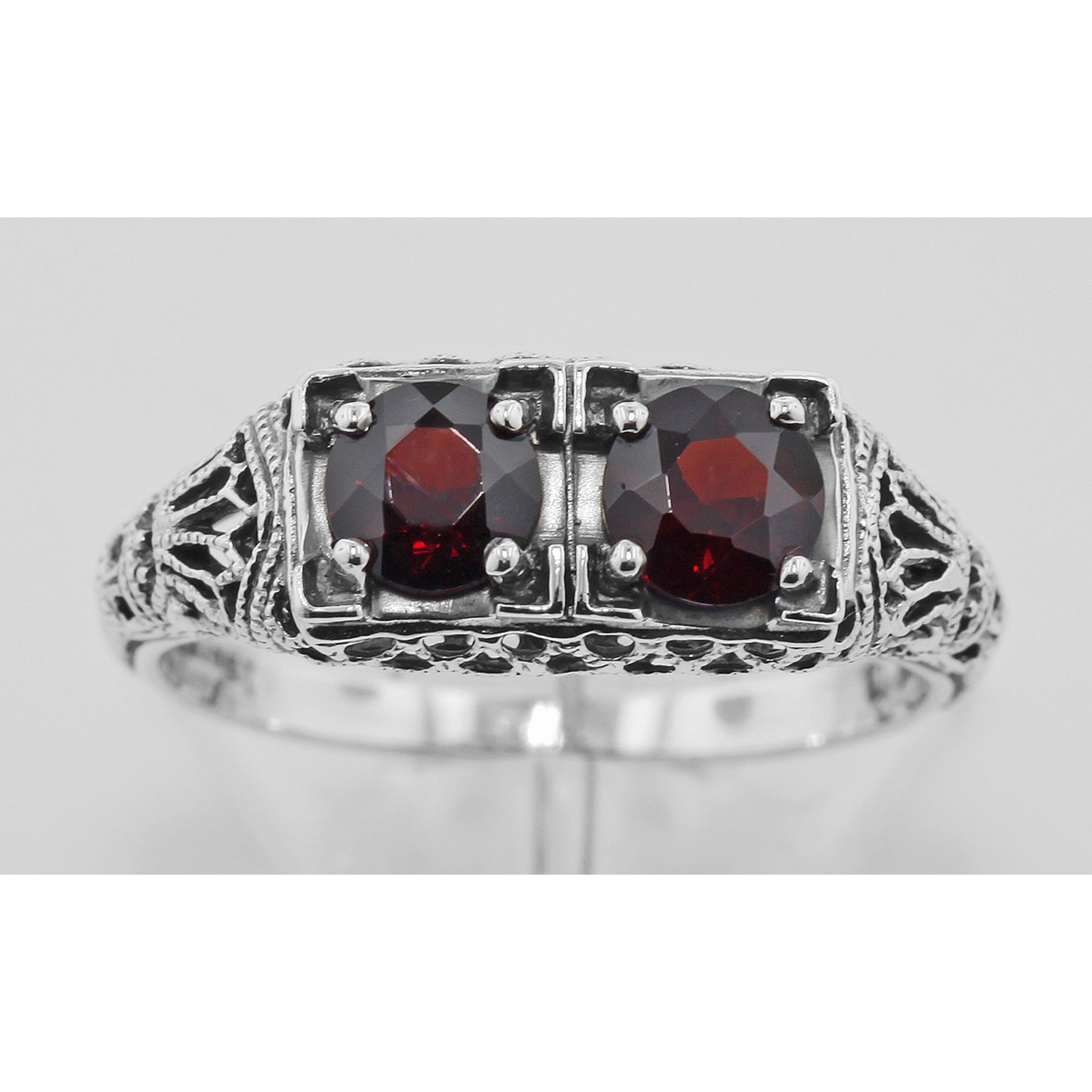 Detail view of Antique Style Garnet Filigree Ring highlighting Garnet