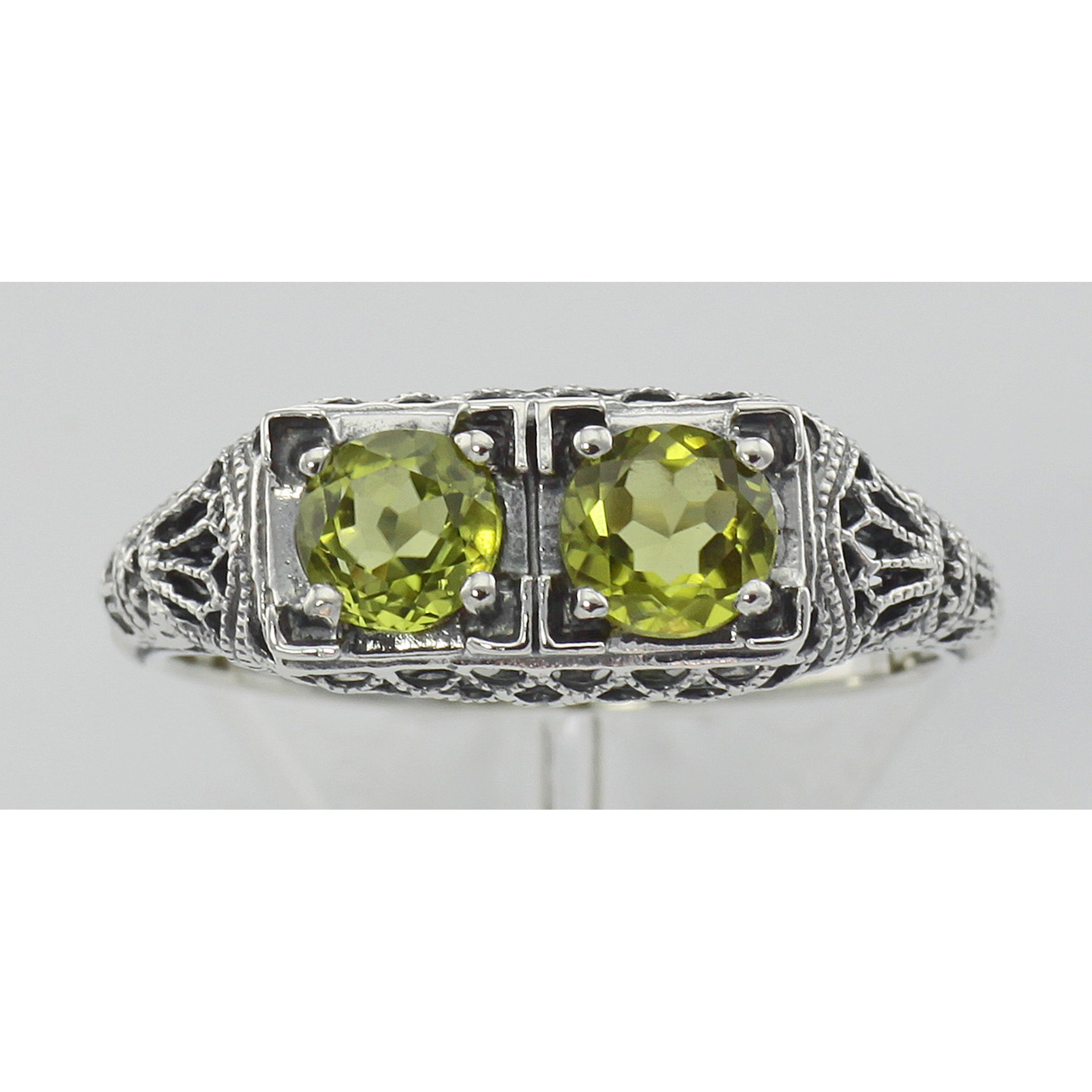 Detail view of Art Deco Style Green Peridot Gemstone Ring Sterling Silver highlighting Peridot