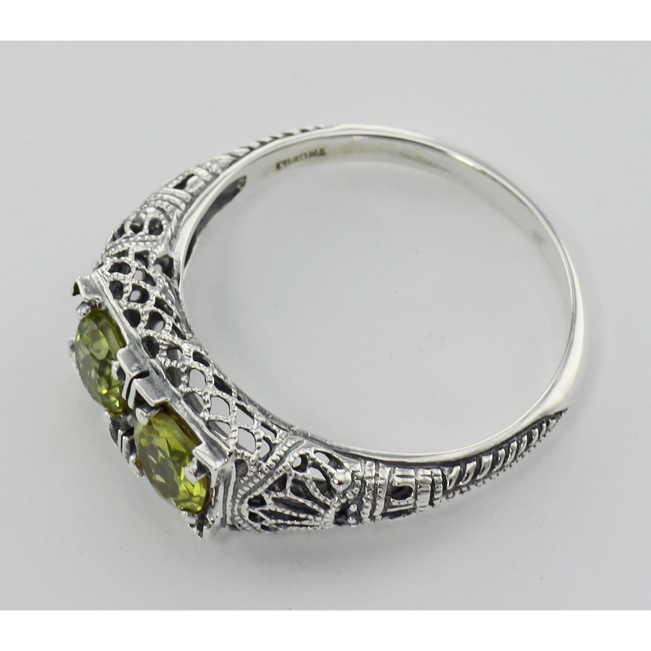 Back view of Art Deco Style Green Peridot Gemstone Ring Sterling Silver showing 925 sterling silver hallmark