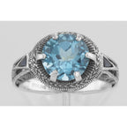 Detail view of Victorian Style Blue Topaz Solitaire Ring Sapphire Accents Sterling Silver highlighting Blue Topaz, Sapphire