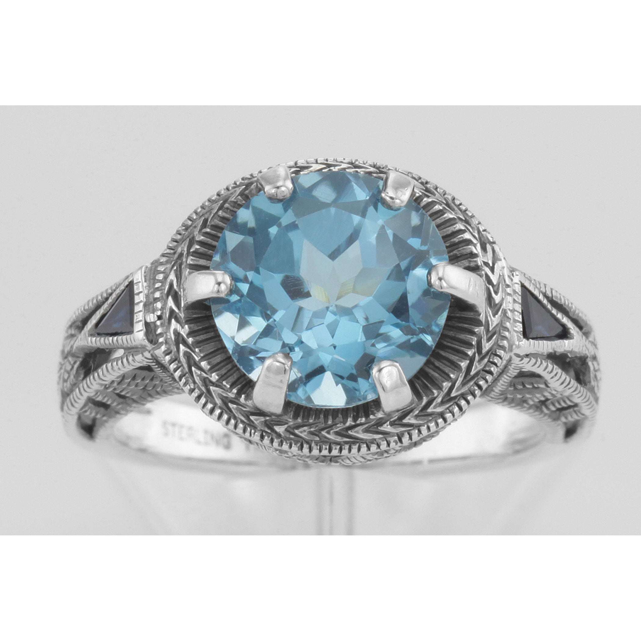 Detail view of Victorian Style Blue Topaz Solitaire Ring Sapphire Accents Sterling Silver highlighting Blue Topaz, Sapphire