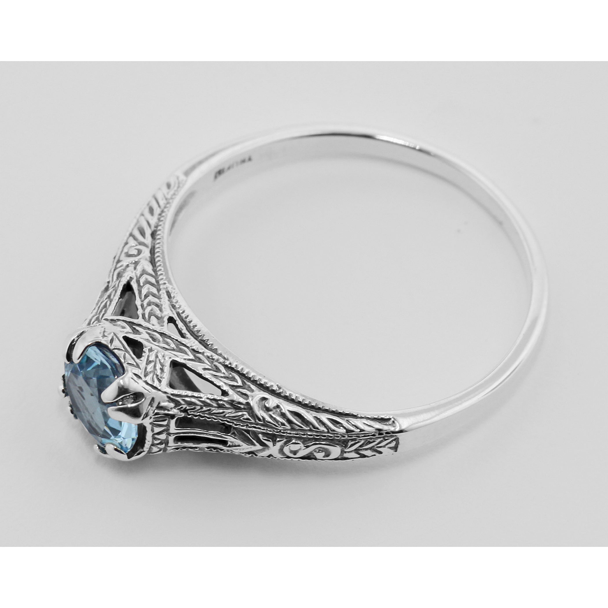 Back view of Antique Style Genuine Blue Topaz Filigree Ring Sterling Silver showing 925 sterling silver hallmark