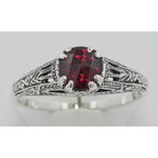 Detail view of Antique Style Red Garnet Filigree Solitaire Ring highlighting Garnet