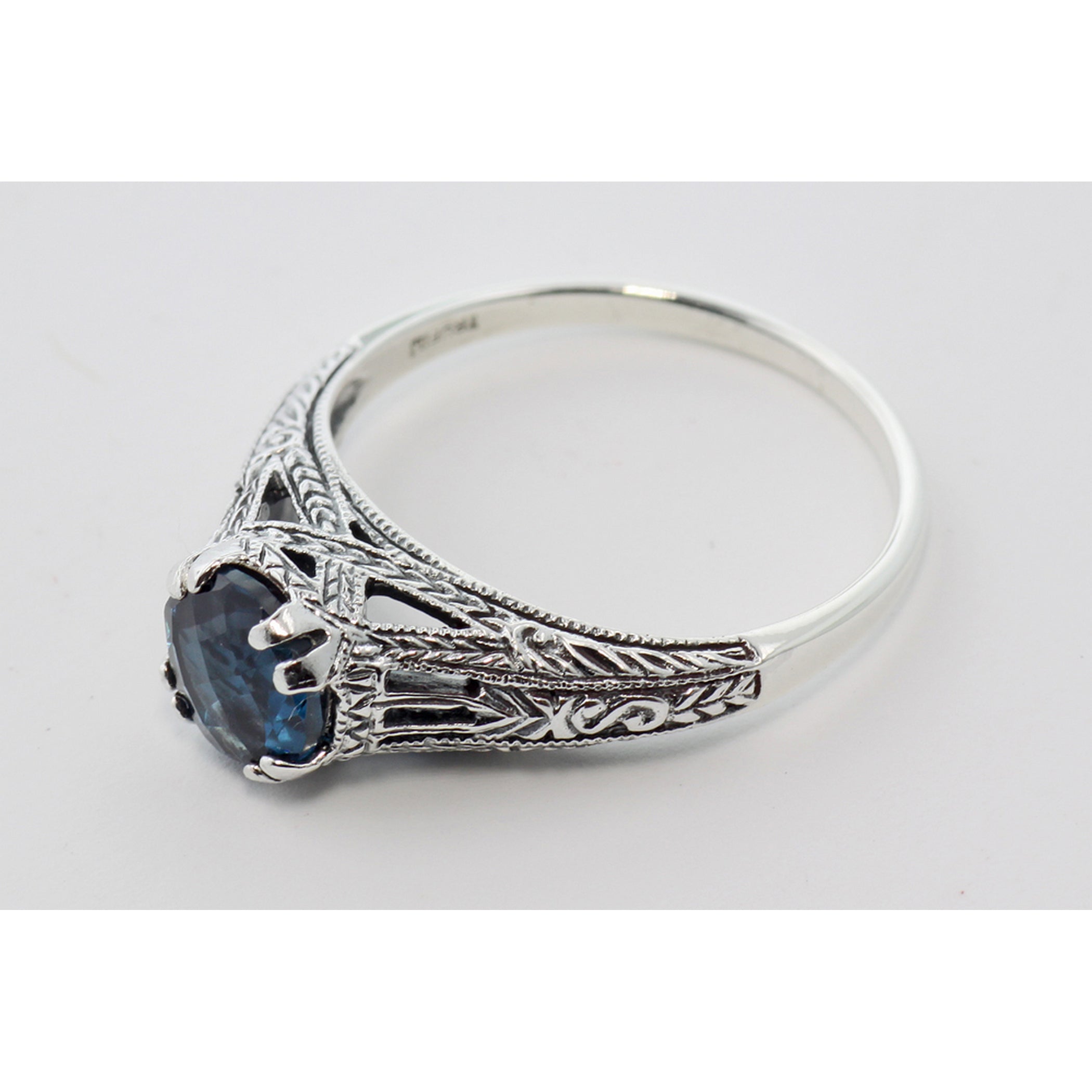 Back view of Antique Style London Blue Topaz Filigree Ring Sterling Silver showing 925 sterling silver hallmark