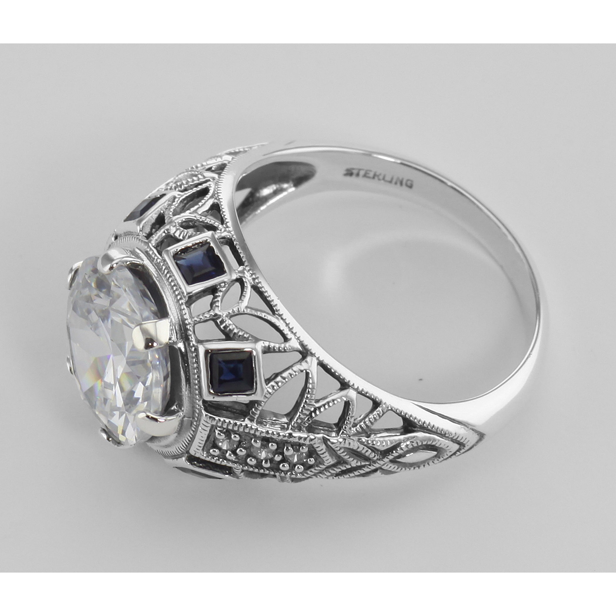 Back view of Art Deco Style Sterling Silver Filigree CZ Ring w/ Sapphires showing 925 sterling silver hallmark