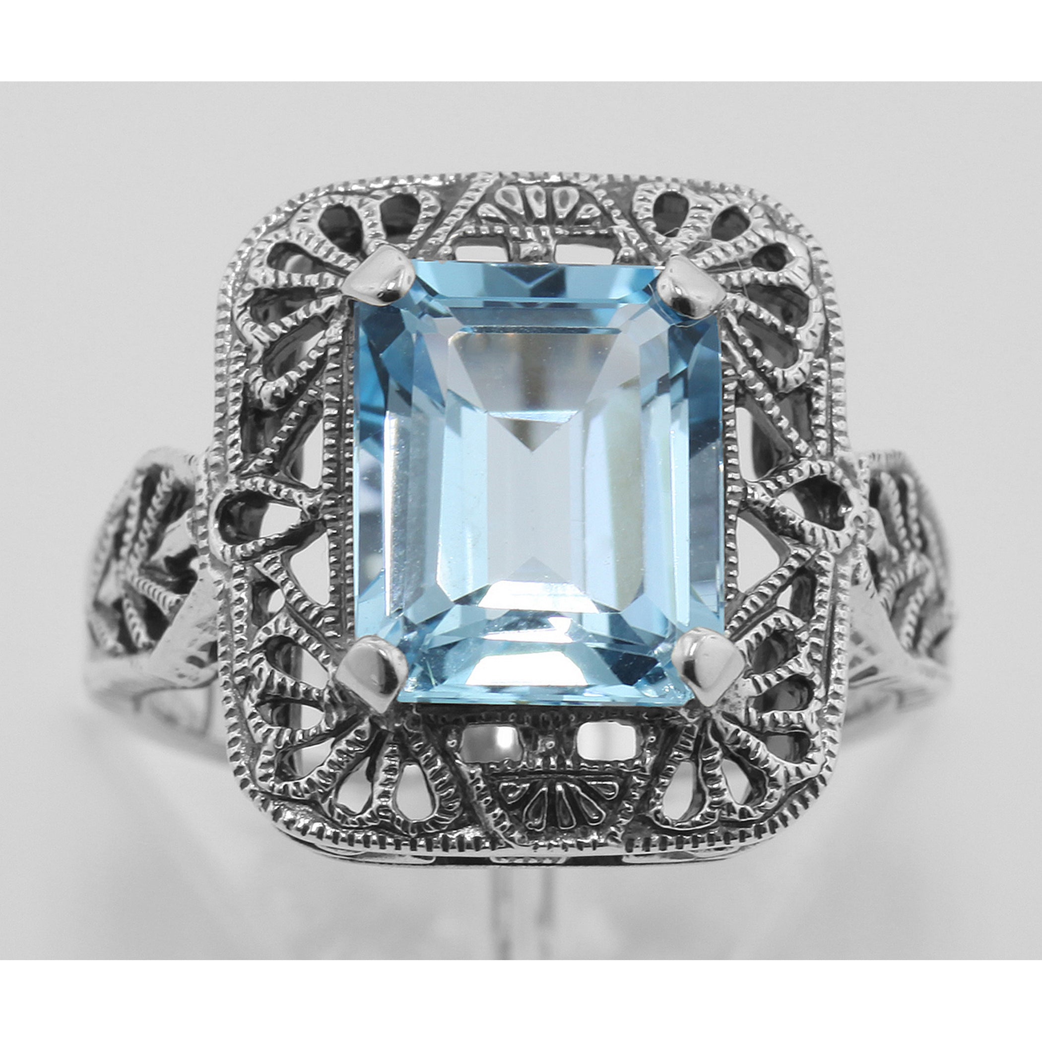 Detail view of Classic Art Deco Style Blue Topaz Filigree Ring highlighting Blue Topaz