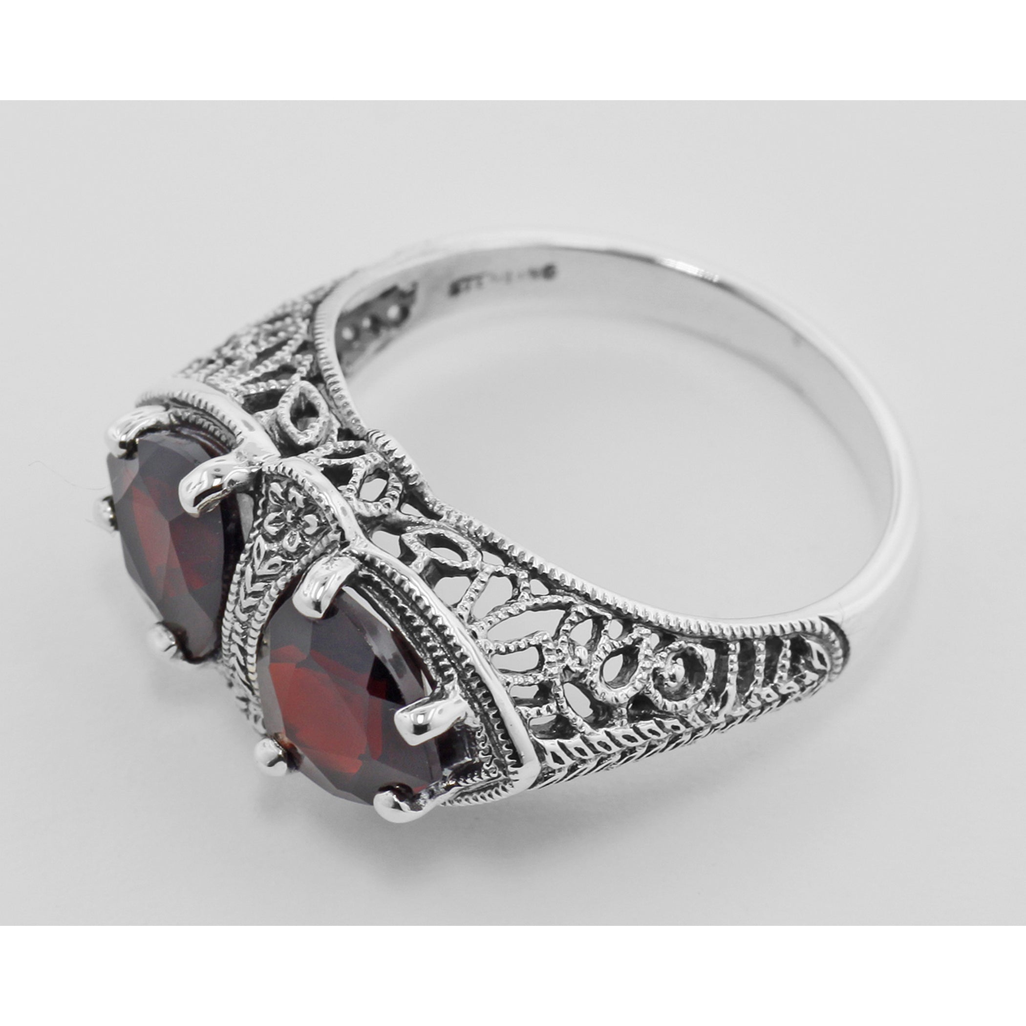 Back view of Unique Art Deco Style Trillion Cut Garnet Filigree Ring Sterling Silver showing 925 sterling silver hallmark