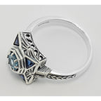 Back view of Art Deco Style Blue Topaz Filigree Ring w/ Sapphire showing 925 sterling silver hallmark