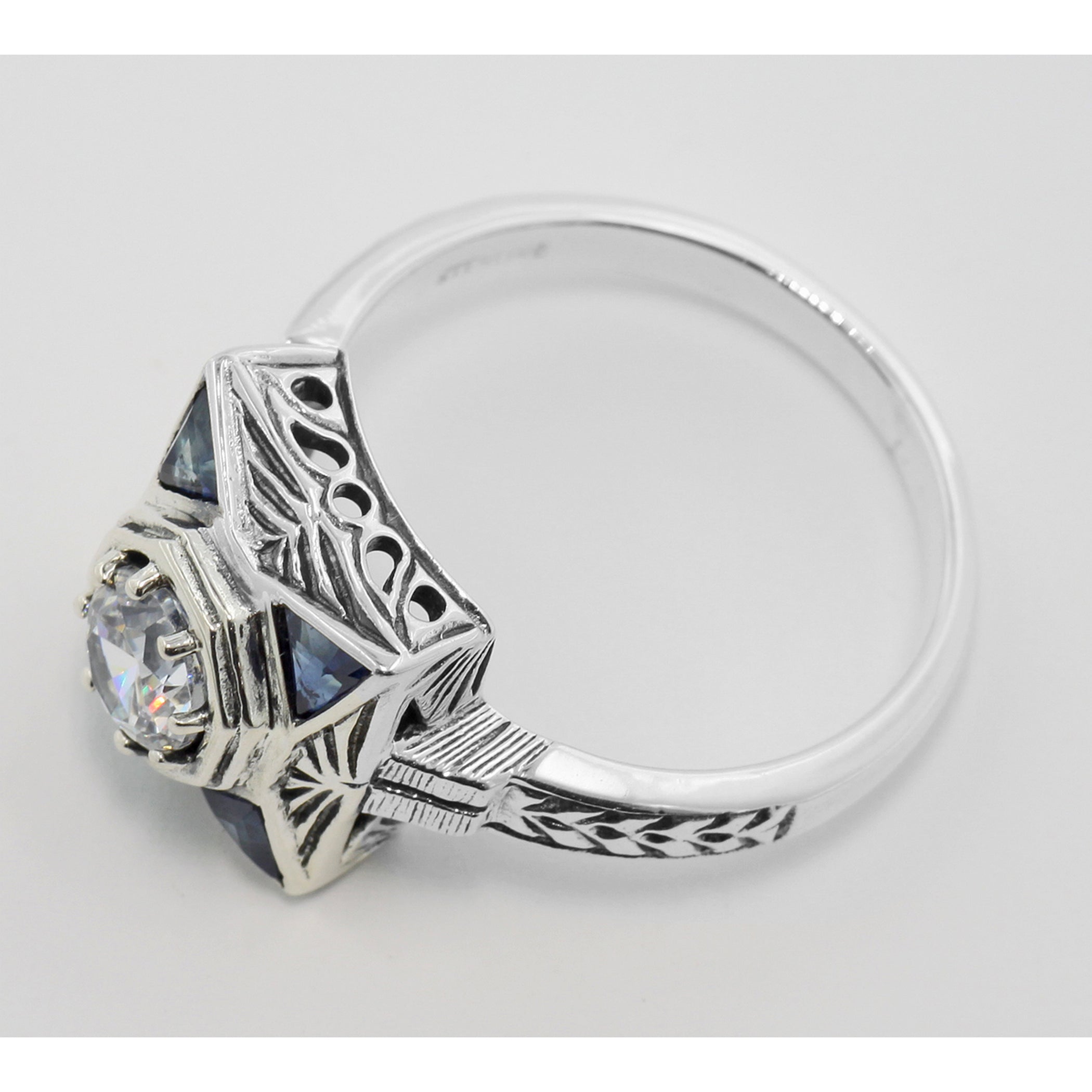 Back view of Art Deco Style White Topaz Filigree Ring w/ Blue Sapphires Sterling Silver showing 925 sterling silver hallmark