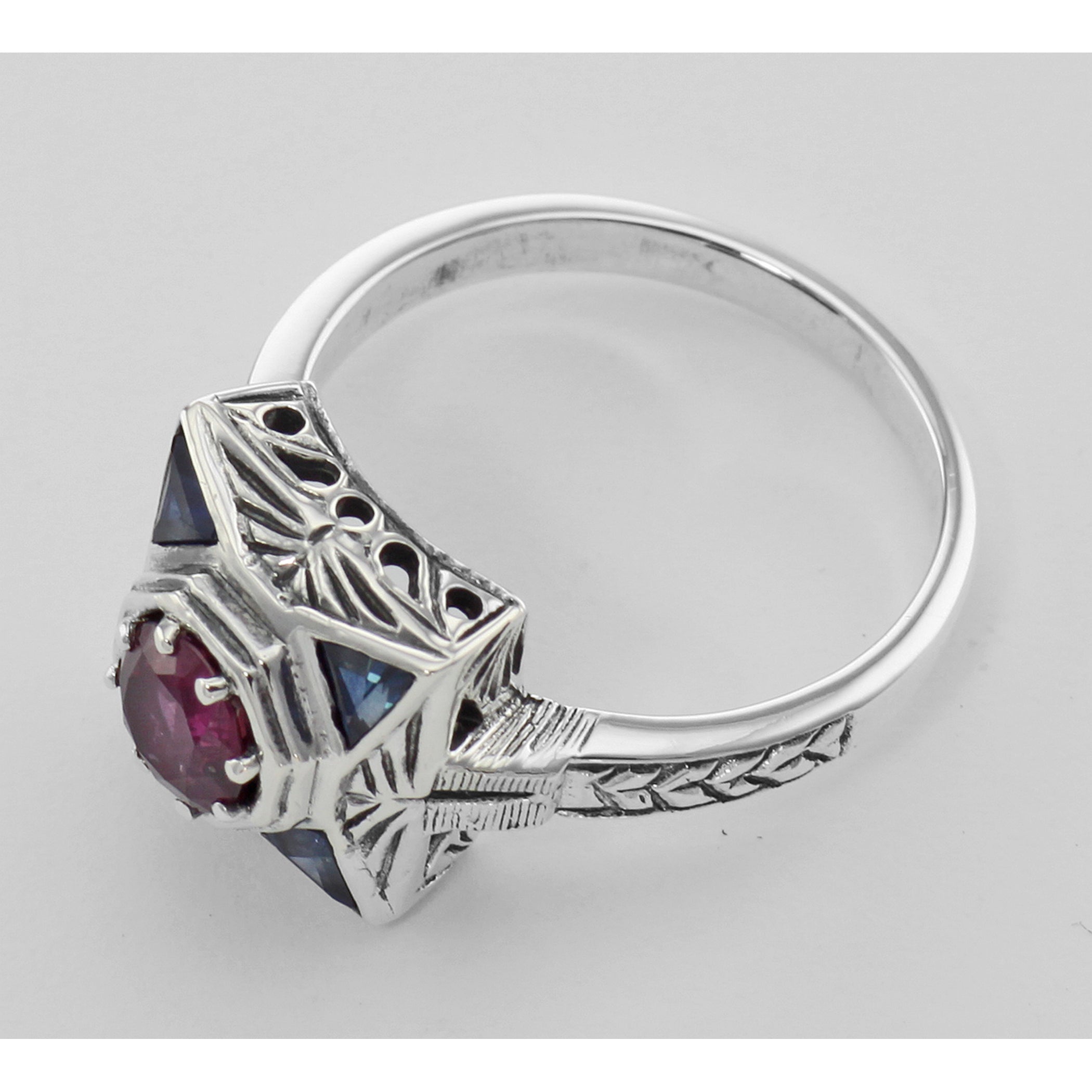 Back view of Art Deco Ruby Filigree Ring w/ Sapphire showing 925 sterling silver hallmark