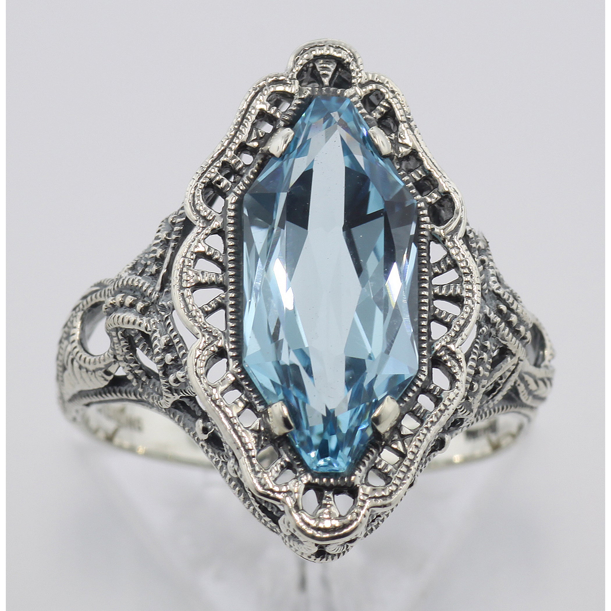 Detail view of Art Deco Style 4 Carat Blue Topaz Filigree Ring highlighting Blue Topaz
