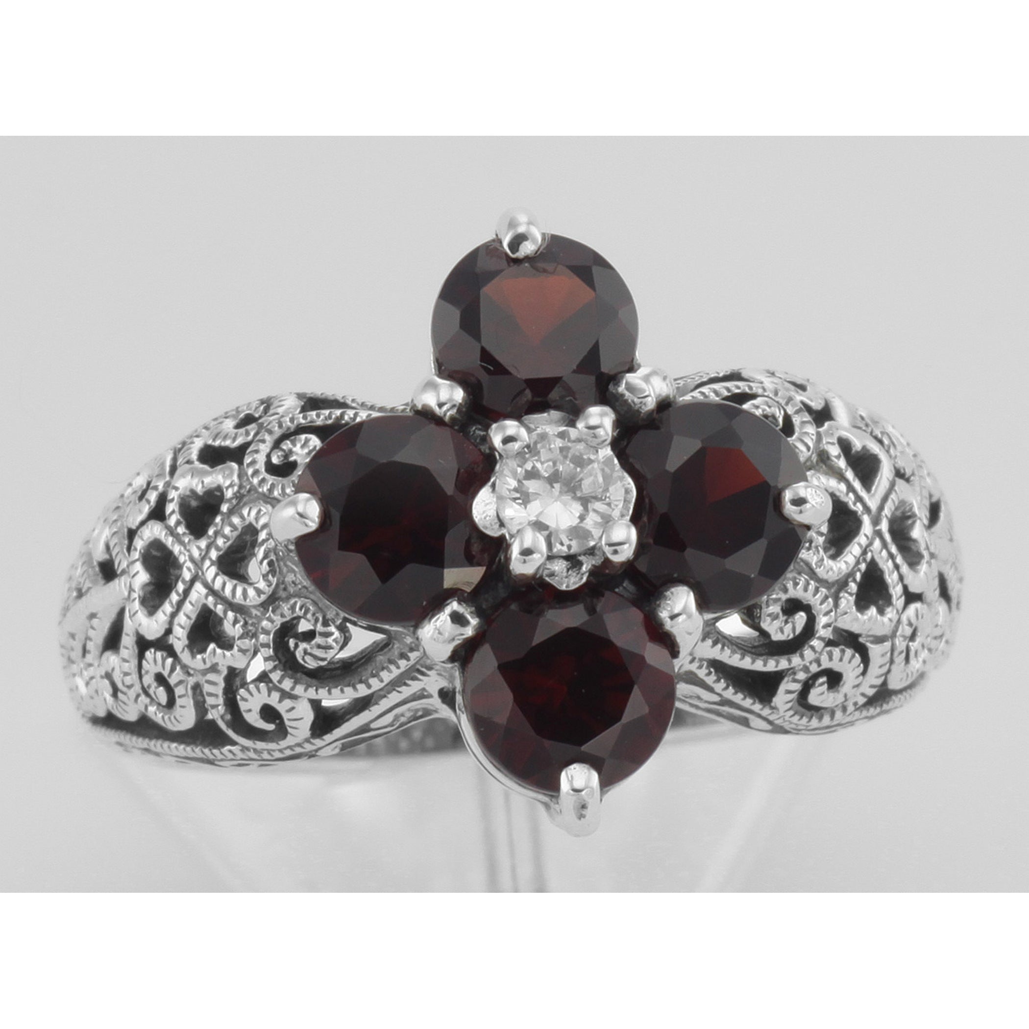 Detail view of Classic Victorian Style Garnet Filigree Ring w/ CZ Center - Sterling Silver Flower Ring highlighting Garnet, C
