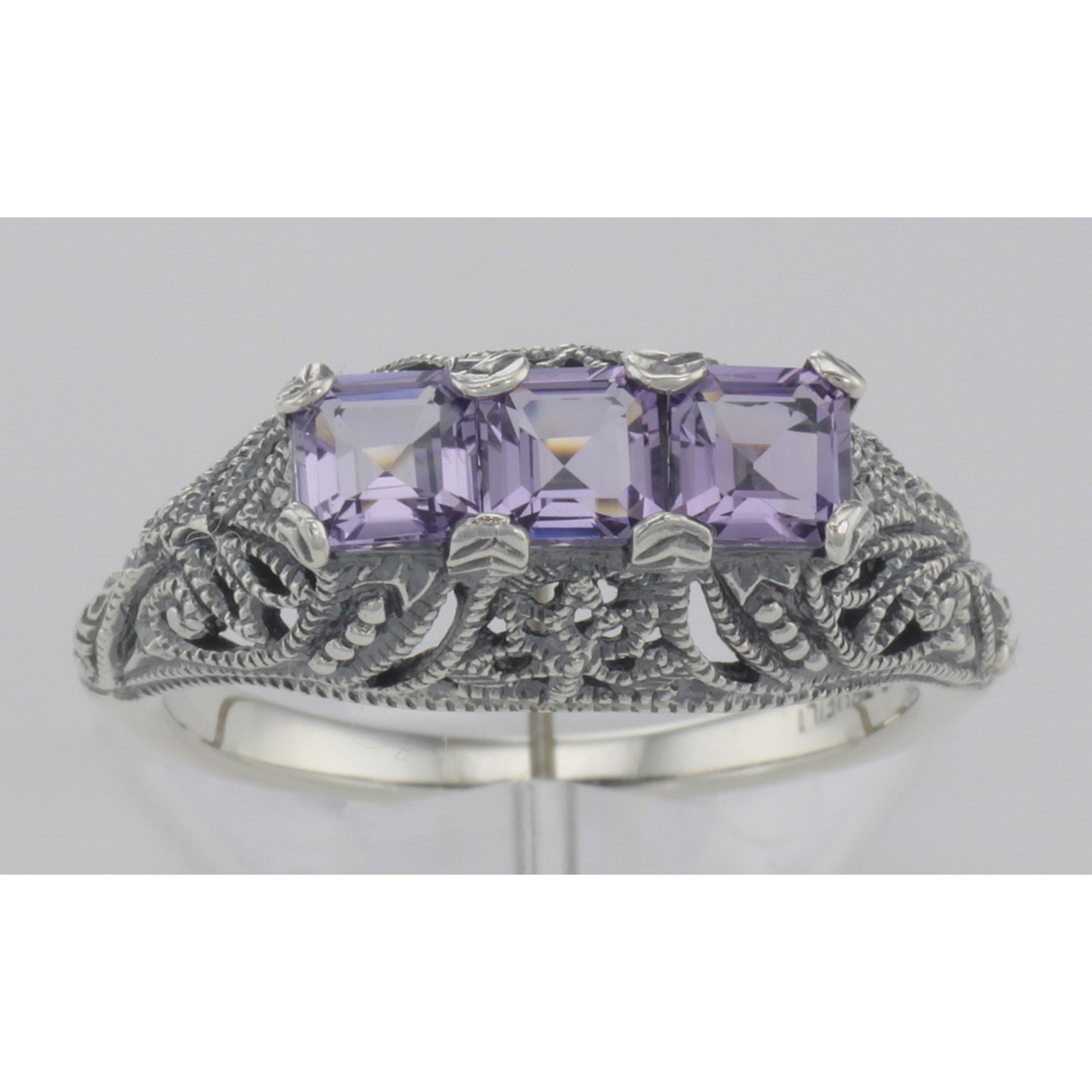 Detail view of Art Deco Style Sterling Silver Filigree Ring 3 Princess Cut Amethyst Gems highlighting Amethyst