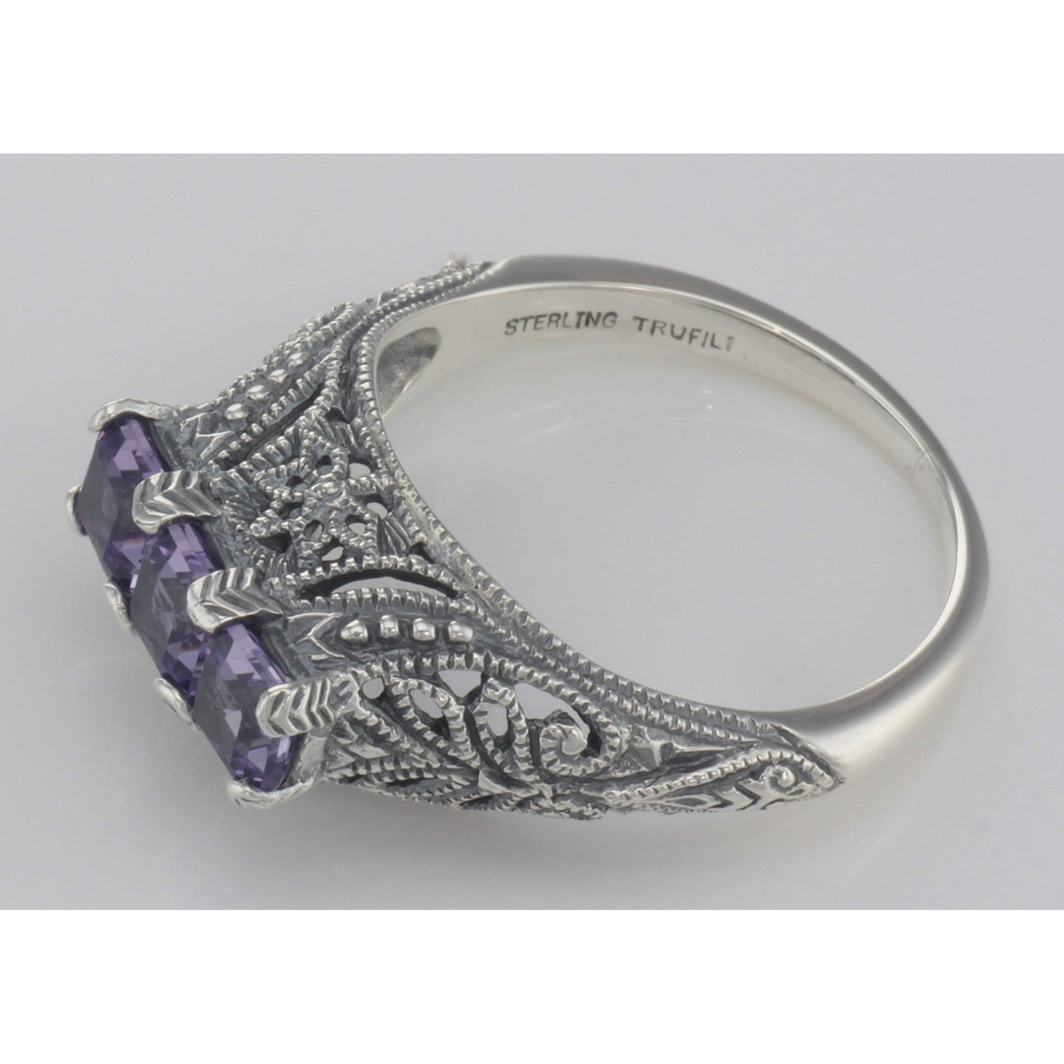 Back view of Art Deco Style Sterling Silver Filigree Ring 3 Princess Cut Amethyst Gems showing 925 sterling silver hallmark