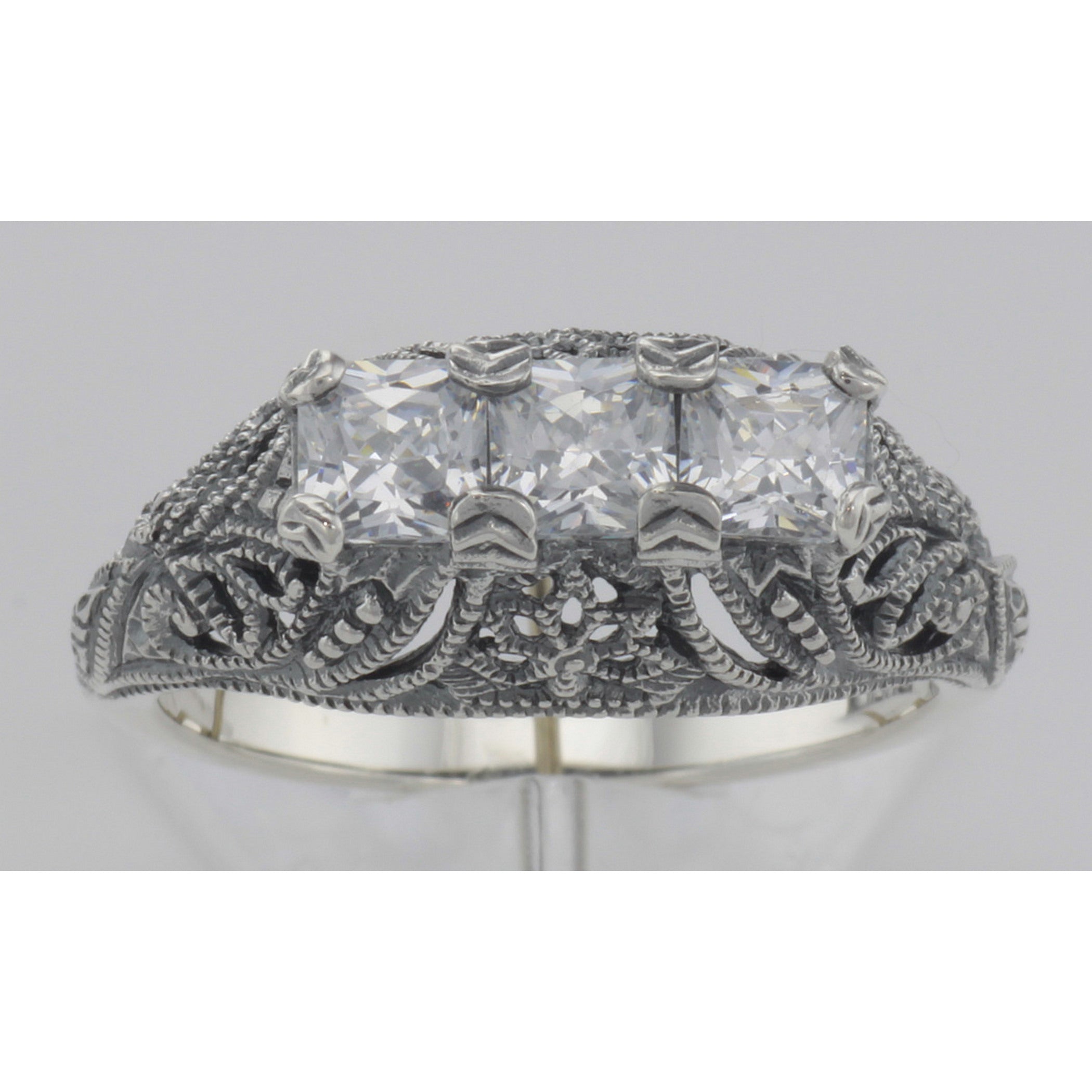 Back view of Art Deco Style Sterling Silver Filigree Ring w/ 3 Princess Cut White Topaz showing 925 sterling silver hallmark