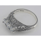 Detail view of Art Deco Style Sterling Silver Filigree Ring w/ 3 Princess Cut White Topaz highlighting White Topaz