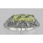Detail view of Art Deco Style Sterling Silver Filigree Ring 3 Princess Cut Peridot Gems highlighting Peridot