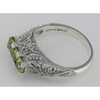 Back view of Art Deco Style Sterling Silver Filigree Ring 3 Princess Cut Peridot Gems showing 925 sterling silver hallmark