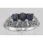 Detail view of Art Deco Style Filigree Ring 3 Princess Cut Blue Sapphires Sterling Silver highlighting Sapphire